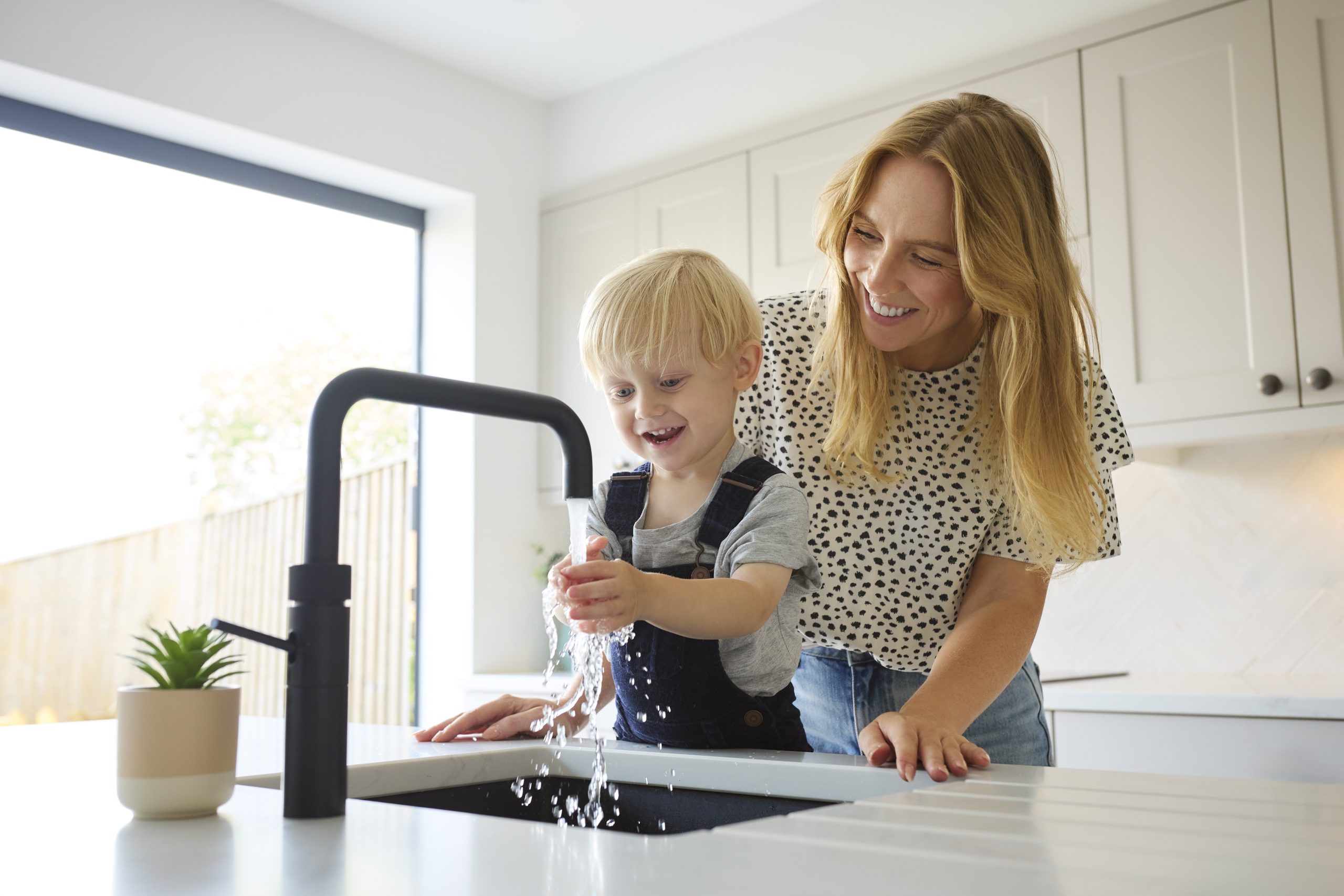 Happy family using soft water